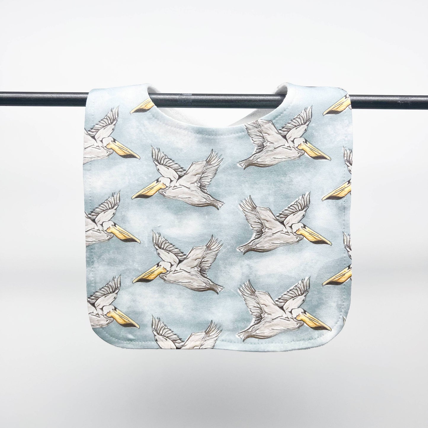 Pelicans on Blue Bib