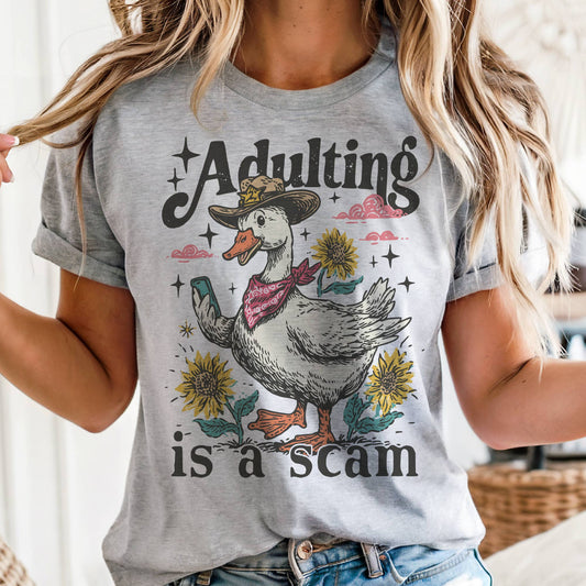 Adulting Is A Scam Graphic Tee